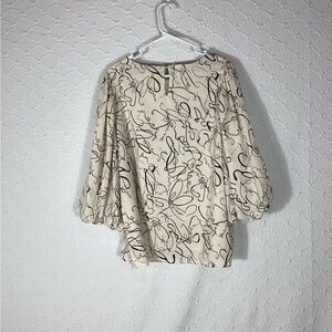 Annie wear large Elegant Cream Blouse with Black Abstract Design